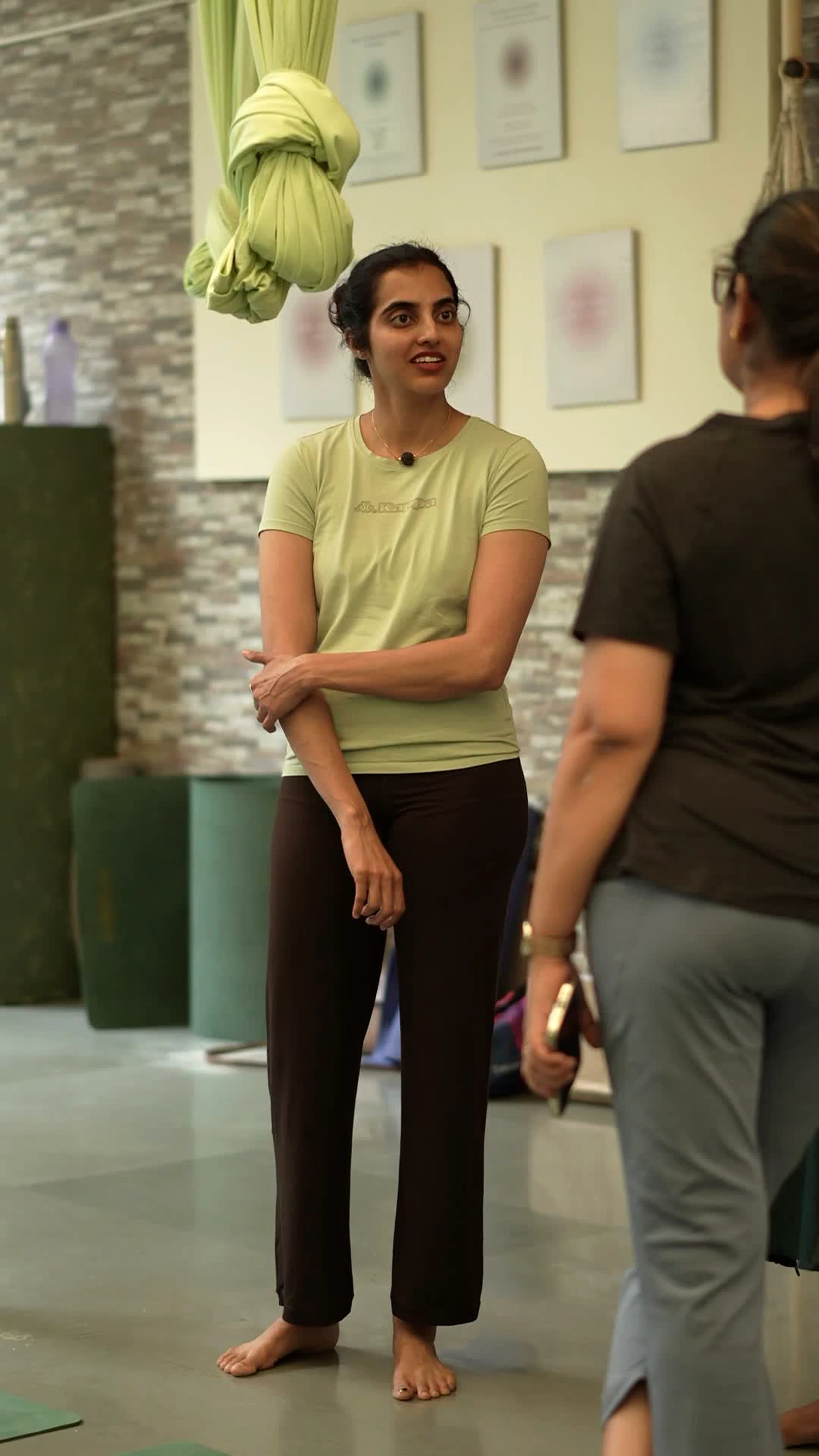 A member smiling during a conversation at The Sphere